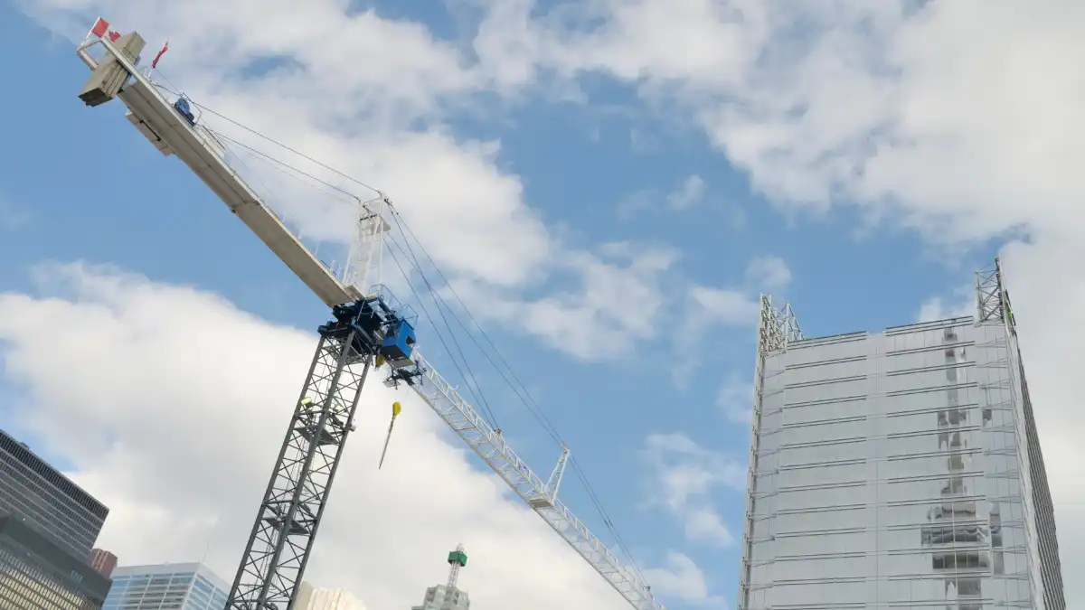construction crane in front of toronto condos